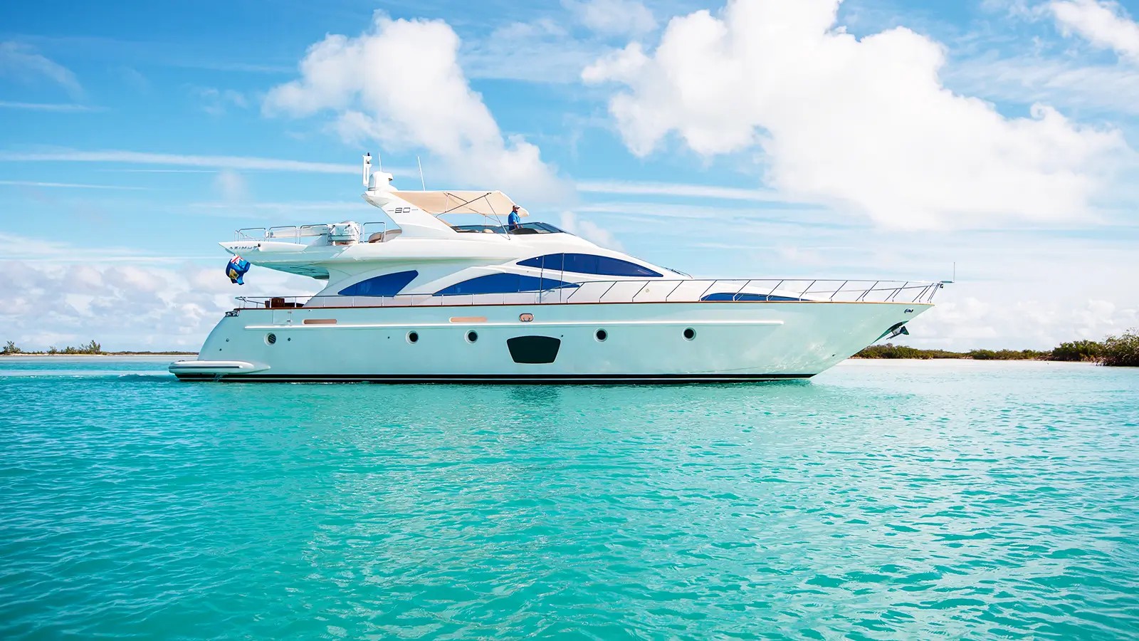 Privé's Azimut luxury motor yacht on turquoise waters.